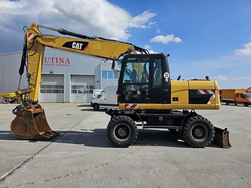Caterpillar M315D - Колесен багер: снимка 1 Caterpillar M315D - Колесен багер: снимка 1