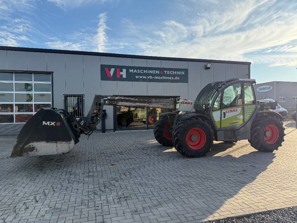 Claas 7040 - Телескопичен товарач: снимка 1 Claas 7040 - Телескопичен товарач: снимка 1