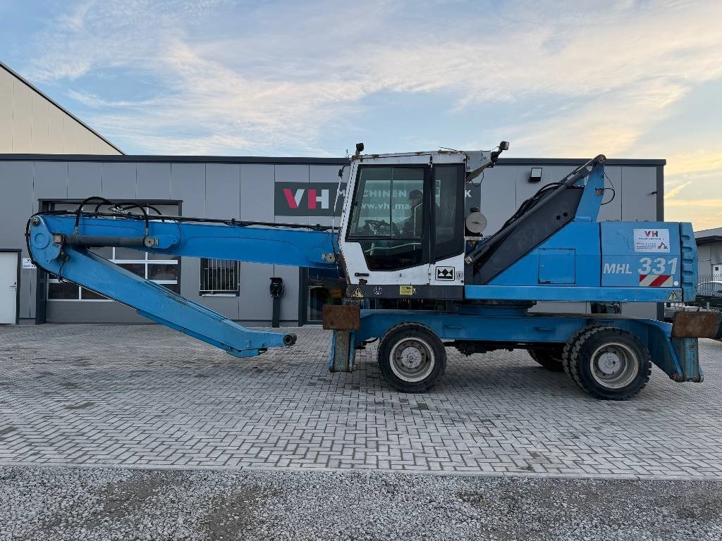 Fuchs MHL 331 - Багер за манипулиране на материали: снимка 2 Fuchs MHL 331 - Багер за манипулиране на материали: снимка 2