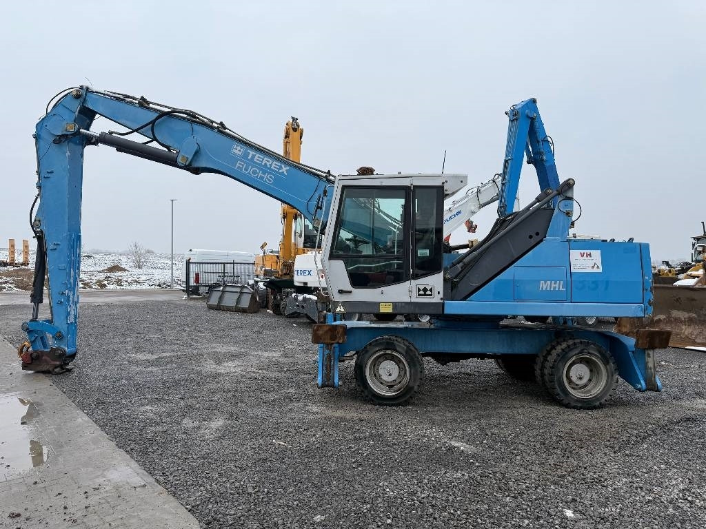 Fuchs MHL 331 - Багер за манипулиране на материали: снимка 2 Fuchs MHL 331 - Багер за манипулиране на материали: снимка 2