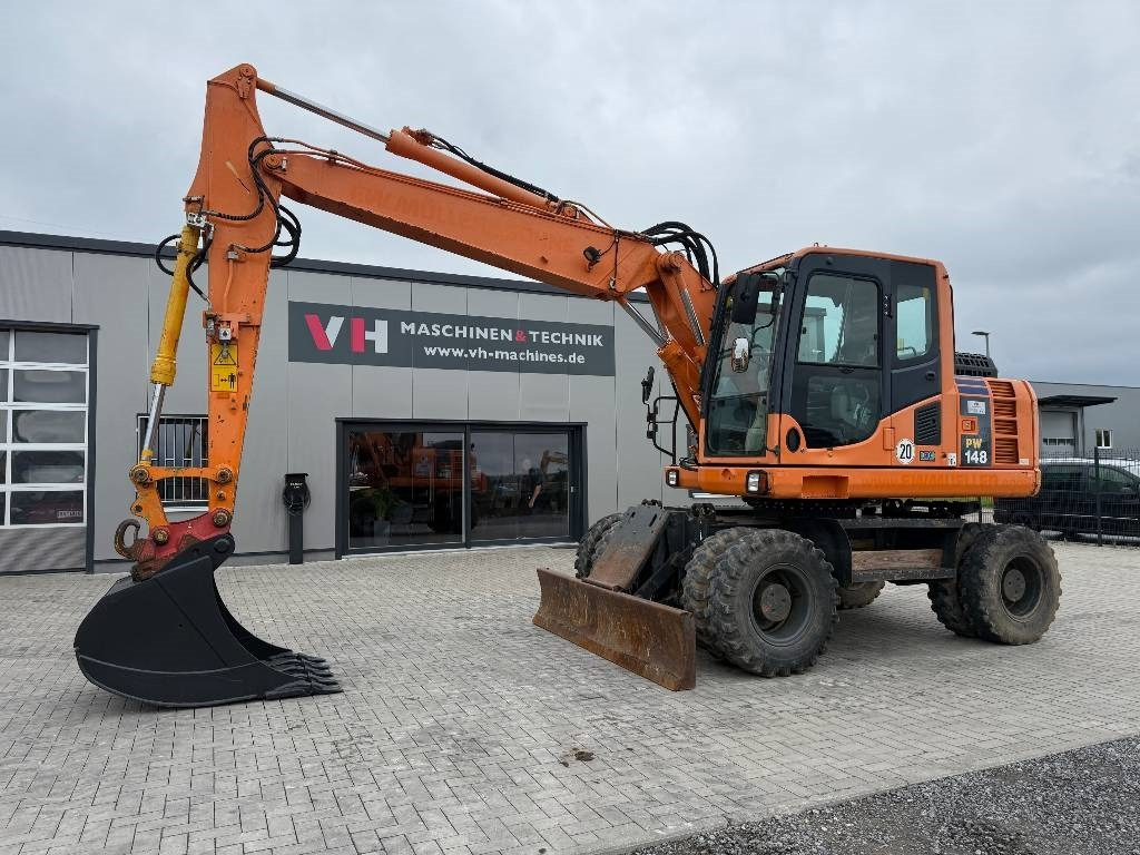 Komatsu PW 148-8 - Колесен багер: снимка 1 Komatsu PW 148-8 - Колесен багер: снимка 1