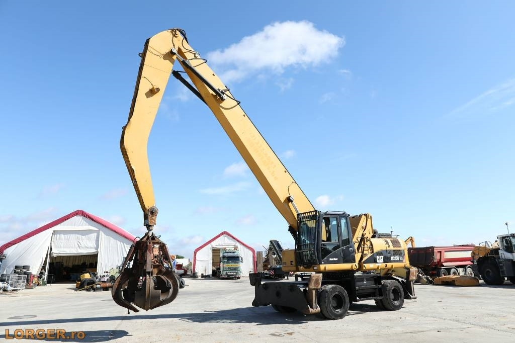 CAT M 325 D MH - Багер за манипулиране на материали: снимка 1 CAT M 325 D MH - Багер за манипулиране на материали: снимка 1