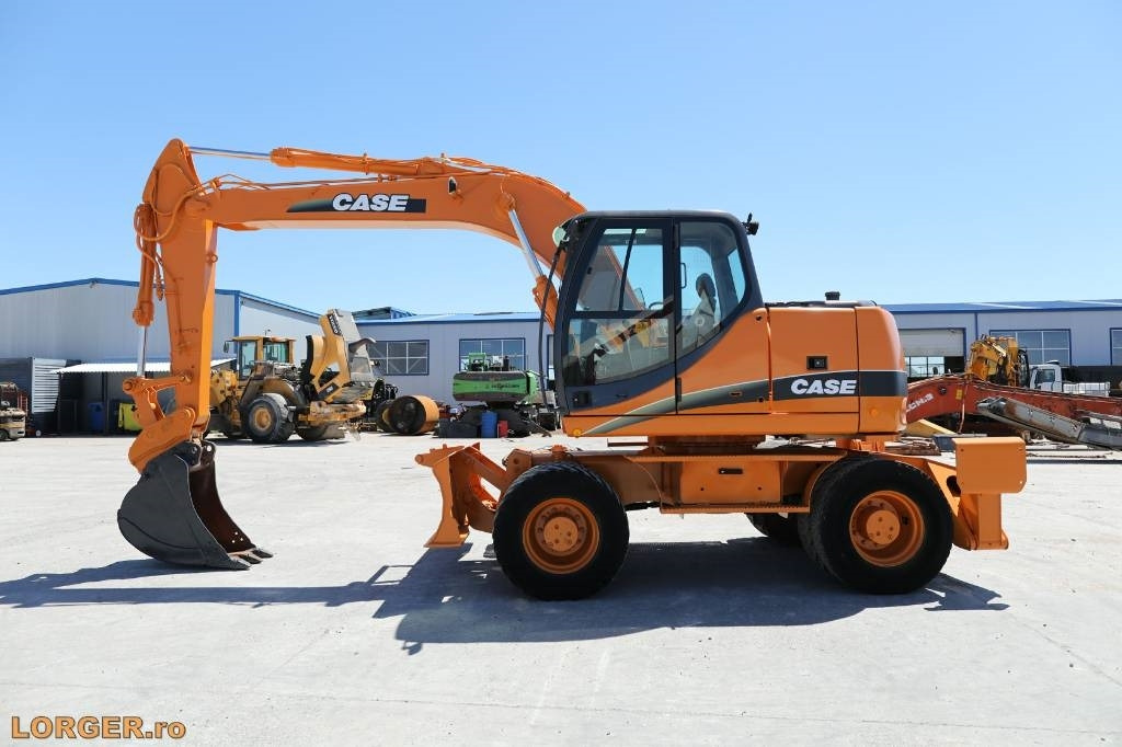 Case WX 145 - Колесен багер: снимка 1 Case WX 145 - Колесен багер: снимка 1