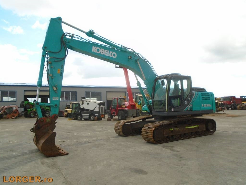 Kobelco SK 210 LC-10 - Верижен багер: снимка 1 Kobelco SK 210 LC-10 - Верижен багер: снимка 1