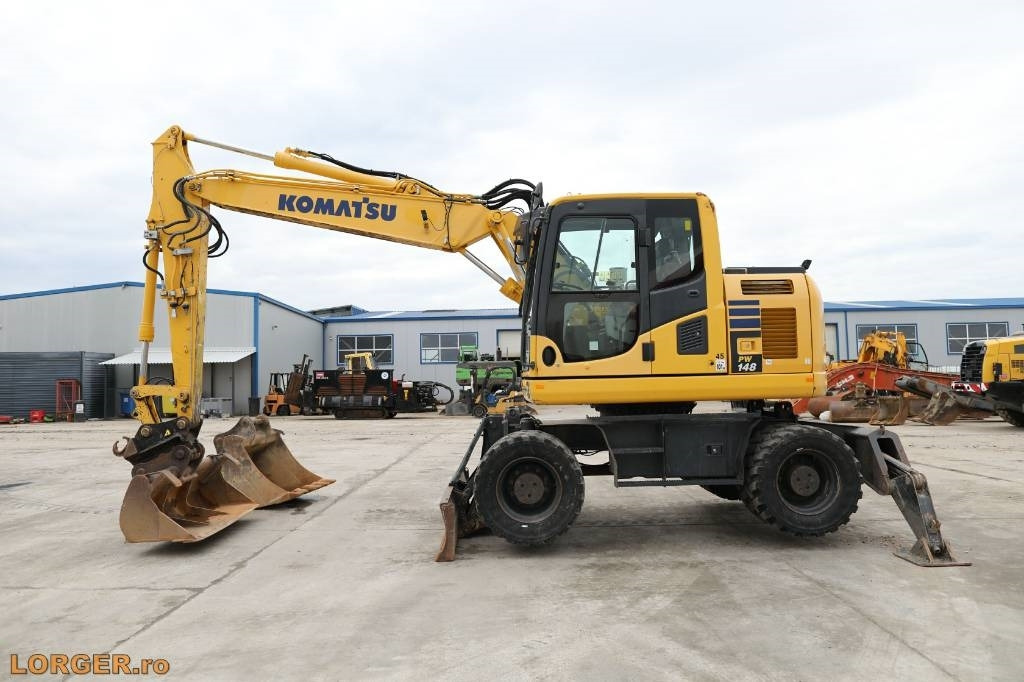 Komatsu PW 148-10 - Колесен багер: снимка 1 Komatsu PW 148-10 - Колесен багер: снимка 1