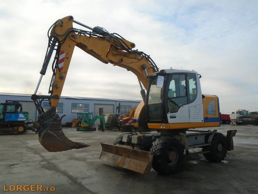 Liebherr A 914 Compact - Колесен багер: снимка 1 Liebherr A 914 Compact - Колесен багер: снимка 1