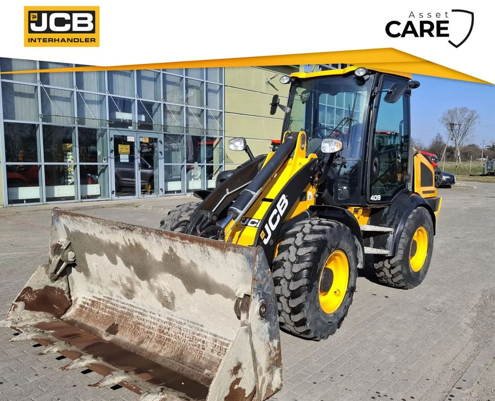 JCB 409 - Колесен багер: снимка 1 JCB 409 - Колесен багер: снимка 1