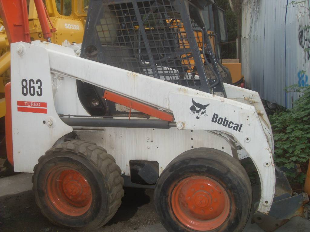 Bobcat 863 - Мини челен товарач: снимка 1 Bobcat 863 - Мини челен товарач: снимка 1
