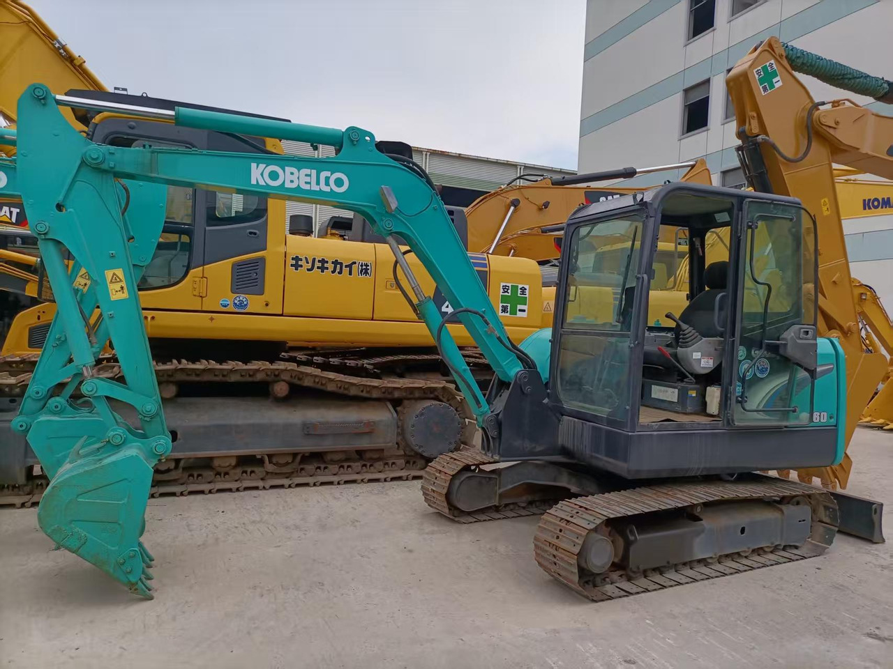 Kobelco SK60 - Мини багер: снимка 1 Kobelco SK60 - Мини багер: снимка 1