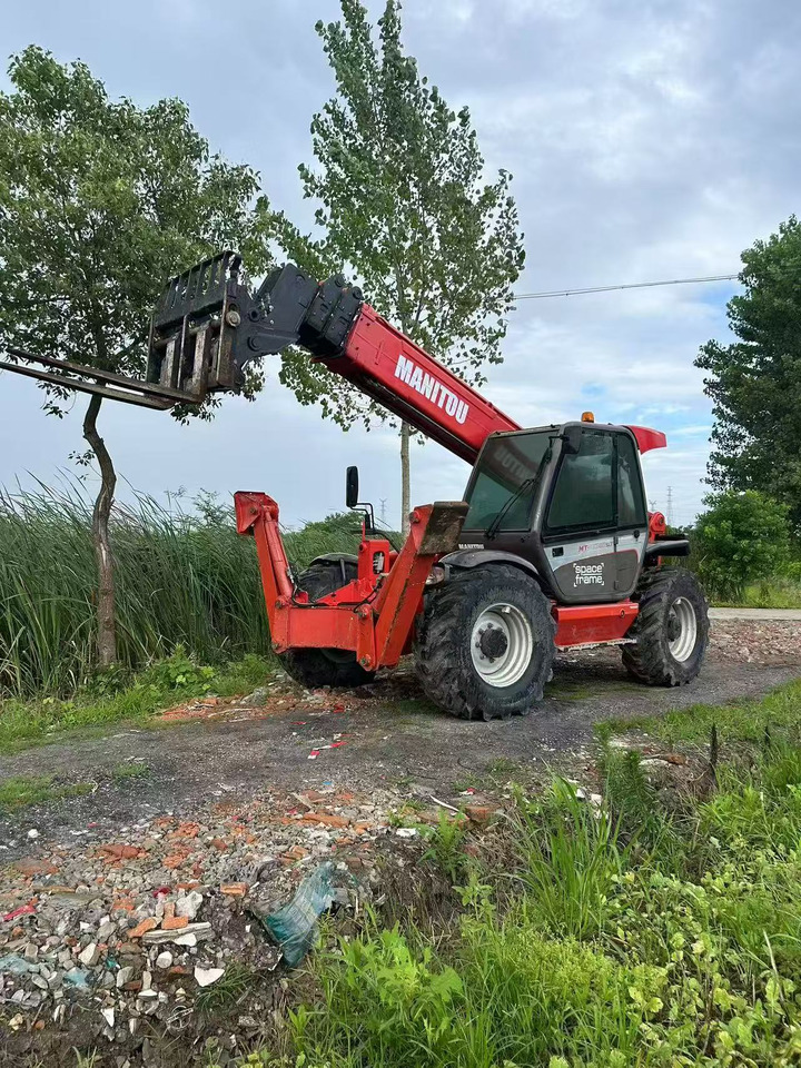 MANITOU MT-1740 - Телескопичен товарач: снимка 4 MANITOU MT-1740 - Телескопичен товарач: снимка 4