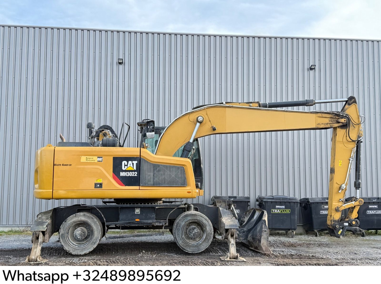 CAT MH3022 - Колесен багер: снимка 1 CAT MH3022 - Колесен багер: снимка 1