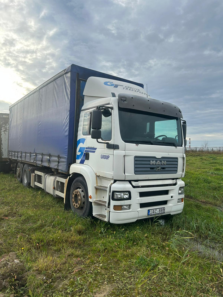 MAN TGA 26.310 - Камион с брезент: снимка 1 MAN TGA 26.310 - Камион с брезент: снимка 1