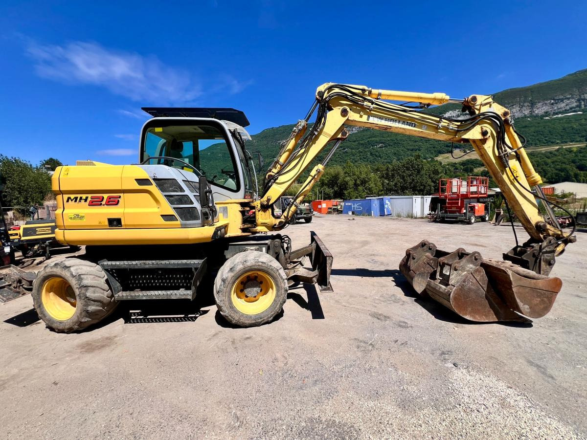 New Holland MH 2.6 PELLE A PNEUS 10T - Колесен багер: снимка 5 New Holland MH 2.6 PELLE A PNEUS 10T - Колесен багер: снимка 5
