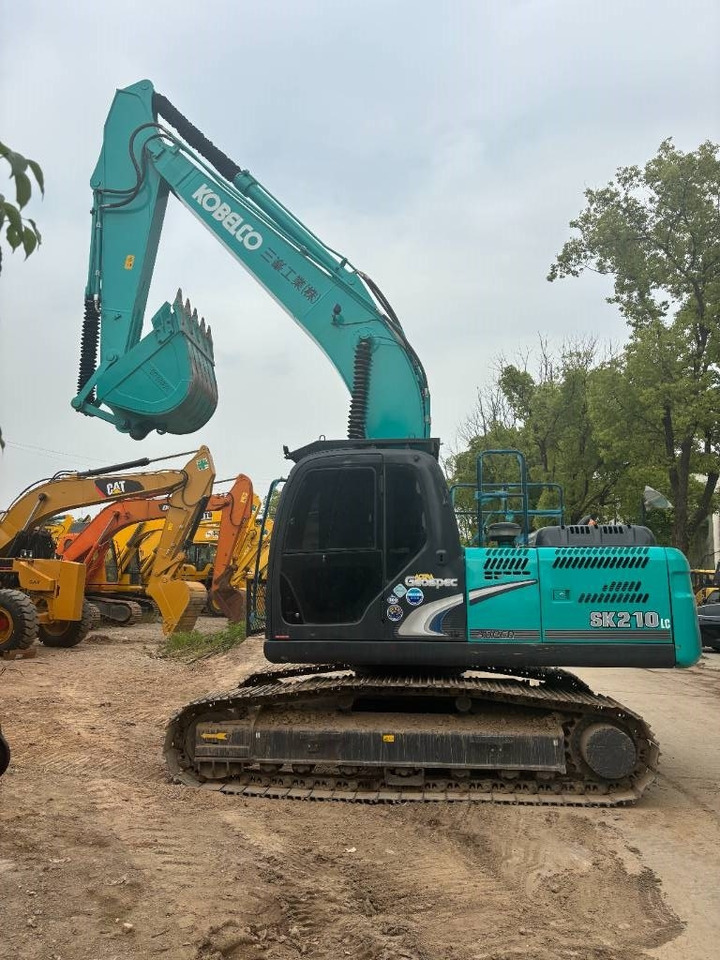 Kobelco SK 210 - Верижен багер: снимка 1 Kobelco SK 210 - Верижен багер: снимка 1