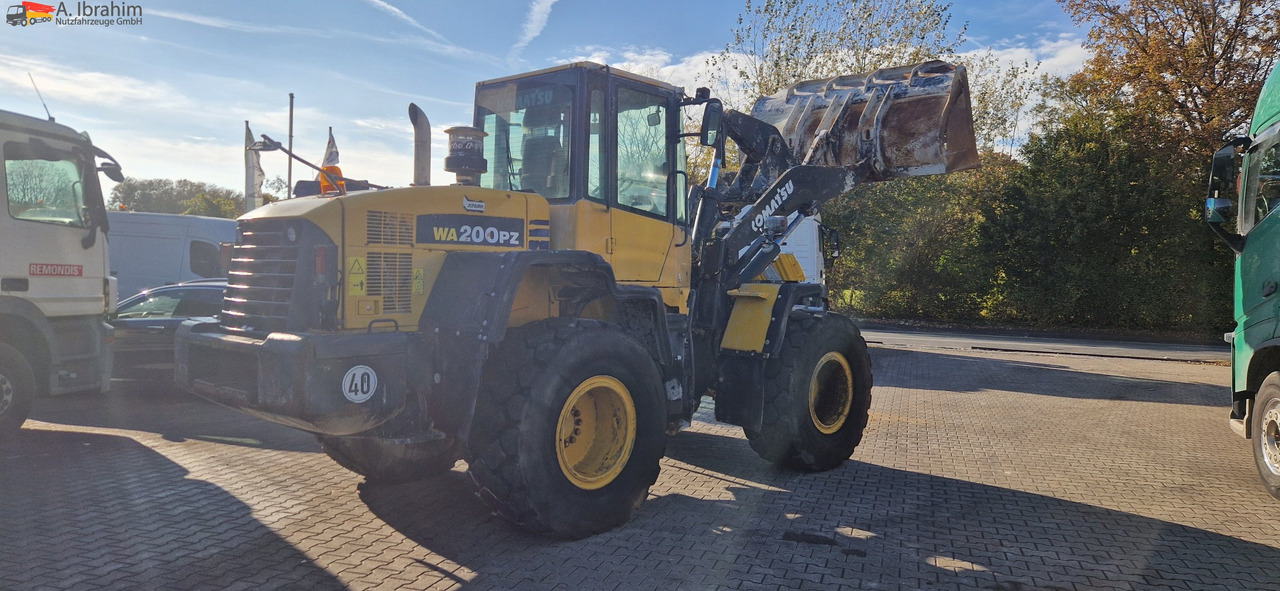 Колесен товарач Komatsu WA 200 technisch ok. technische Wartung beim Komatsu Service: снимка 13