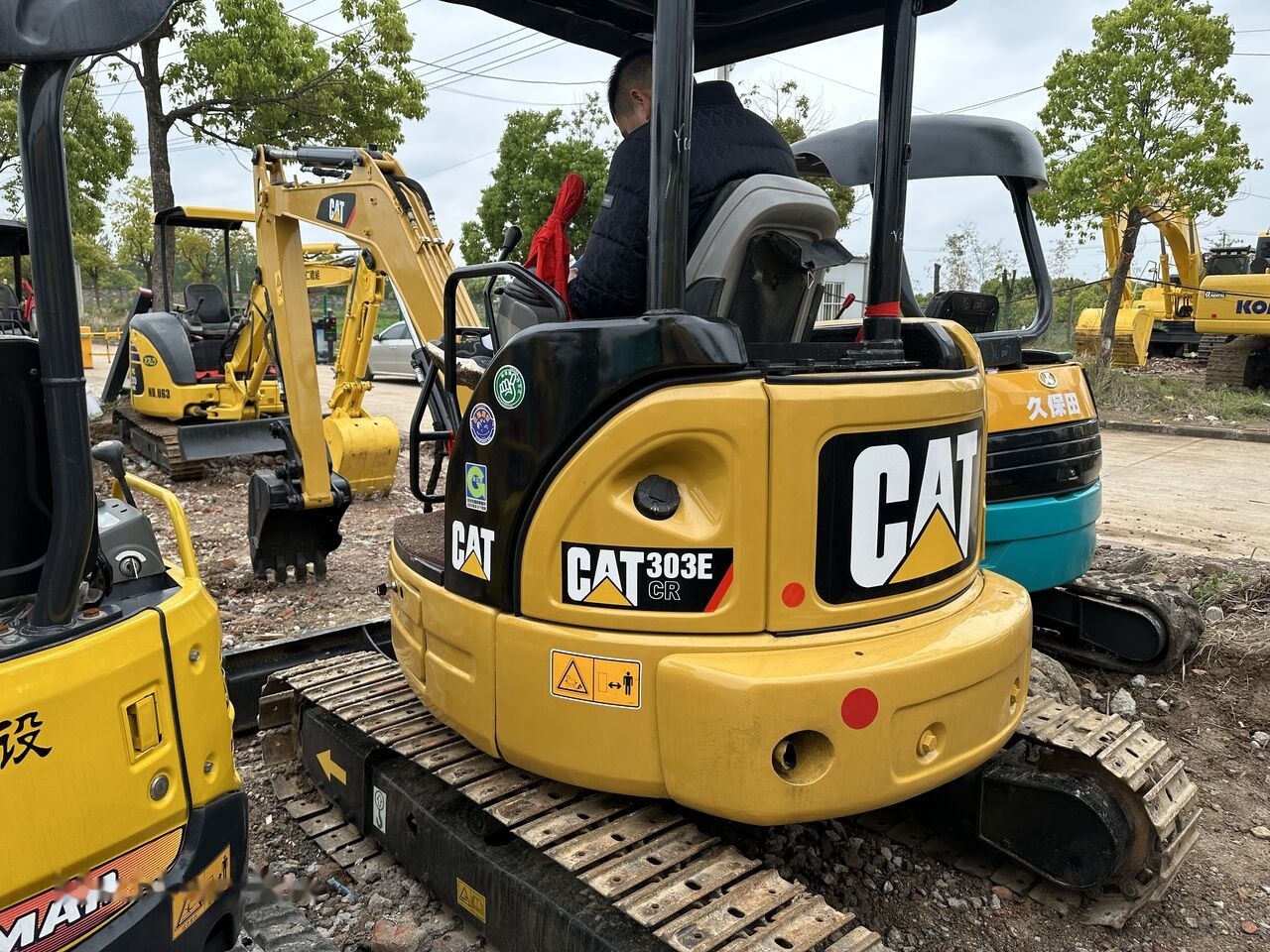 Caterpillar 303E - Мини багер: снимка 1 Caterpillar 303E - Мини багер: снимка 1