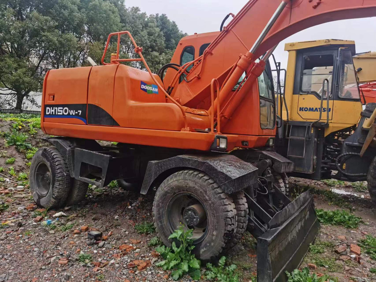 DOOSAN DH150W-7 - Колесен багер: снимка 4 DOOSAN DH150W-7 - Колесен багер: снимка 4