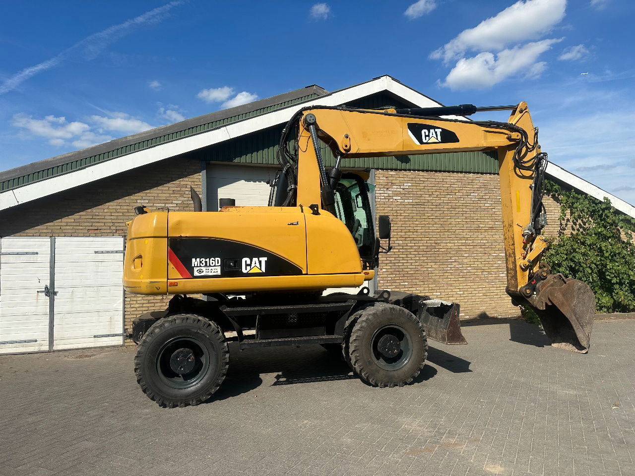 Caterpillar M316D - Колесен товарач: снимка 5 Caterpillar M316D - Колесен товарач: снимка 5