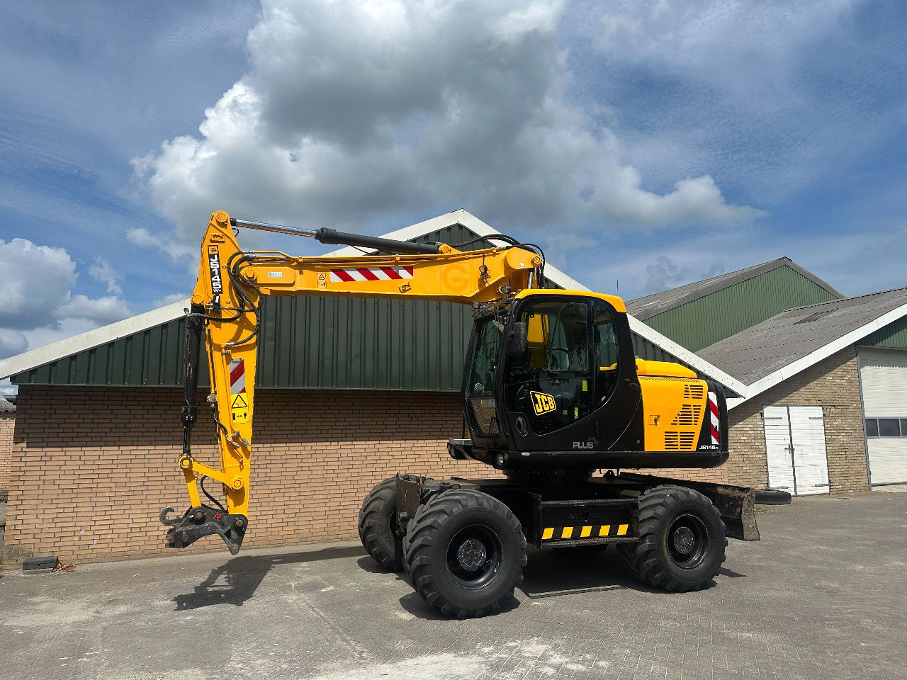 JCB JS145W - Колесен багер: снимка 1 JCB JS145W - Колесен багер: снимка 1