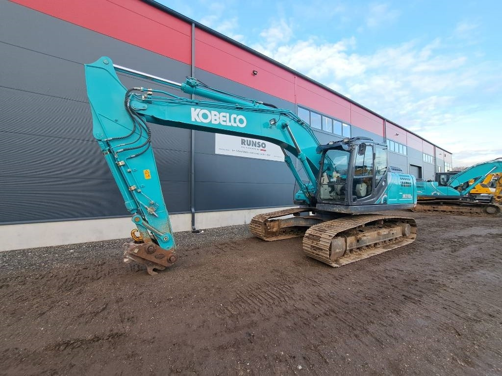 Kobelco SK 210 LC-10 - Верижен багер: снимка 1 Kobelco SK 210 LC-10 - Верижен багер: снимка 1