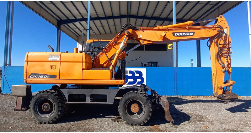 Doosan DX140W-3 - Колесен багер: снимка 2 Doosan DX140W-3 - Колесен багер: снимка 2
