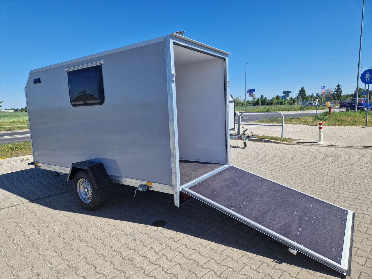 Przyczepa kempingowa Motocamp dla motocykla - Каравана: снимка 1 Przyczepa kempingowa Motocamp dla motocykla - Каравана: снимка 1