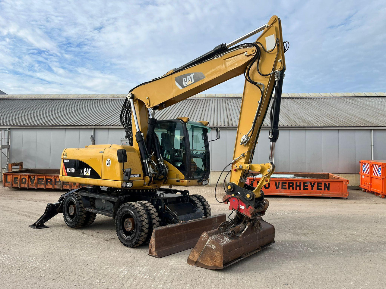 Caterpillar M318D - Колесен багер: снимка 1 Caterpillar M318D - Колесен багер: снимка 1
