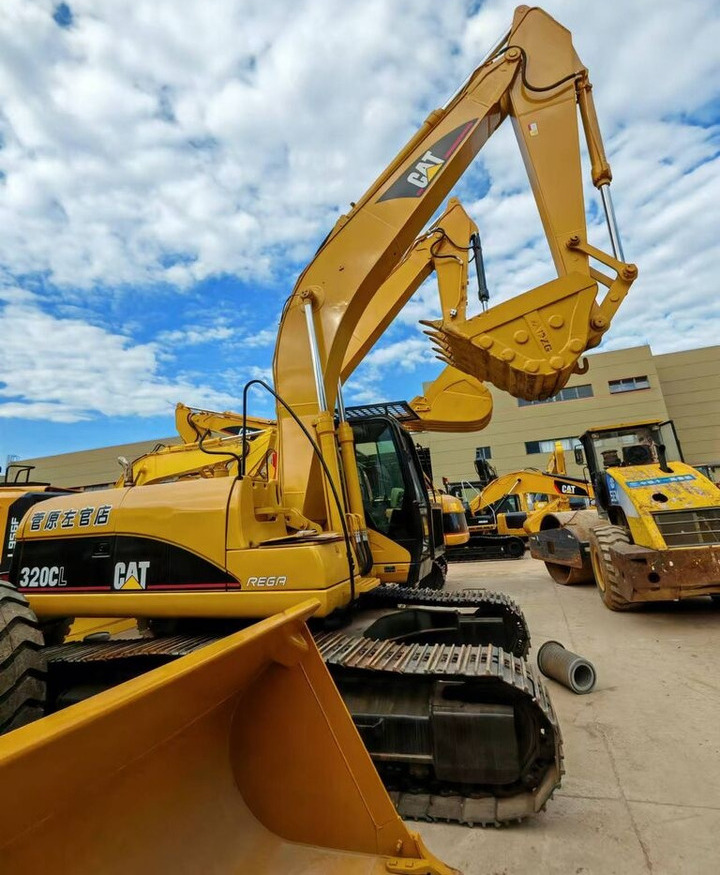 Caterpillar 320CL - Колесен багер: снимка 2 Caterpillar 320CL - Колесен багер: снимка 2