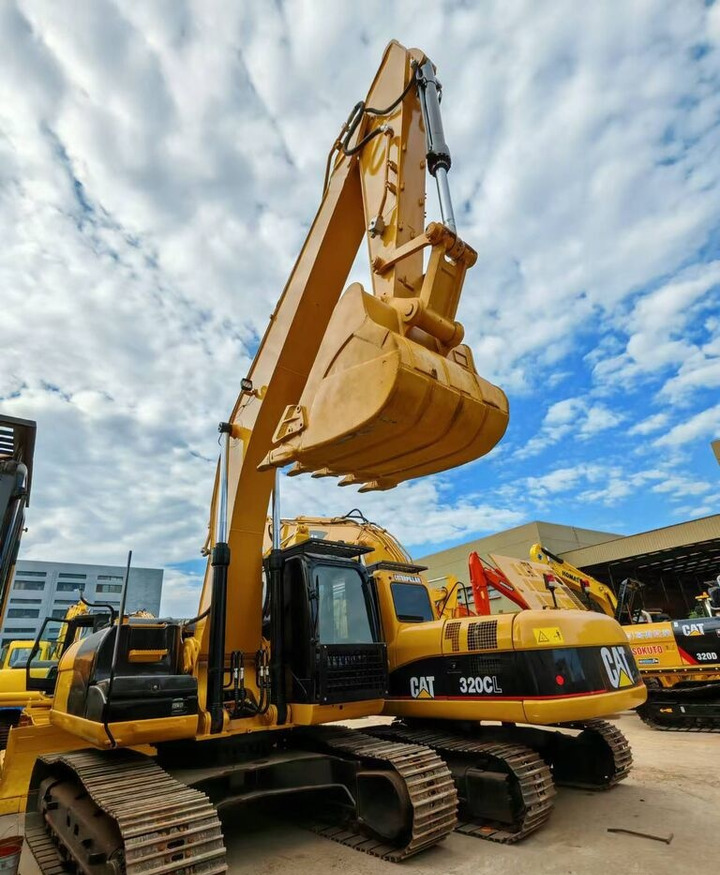 Caterpillar 320CL - Колесен багер: снимка 1 Caterpillar 320CL - Колесен багер: снимка 1