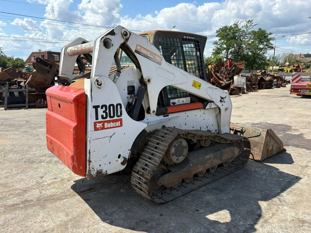 Bobcat T 300 - Мини челен товарач: снимка 2 Bobcat T 300 - Мини челен товарач: снимка 2