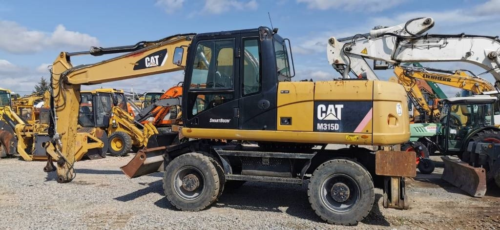 CAT M 315 D - Колесен багер: снимка 4 CAT M 315 D - Колесен багер: снимка 4
