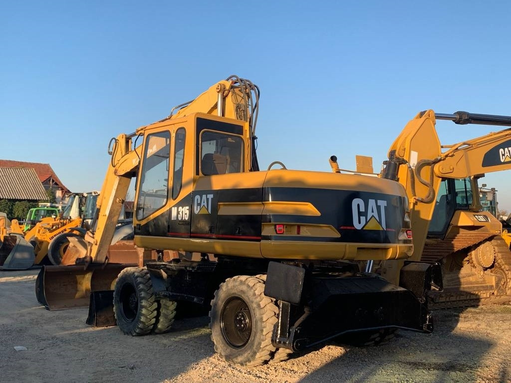 CAT M 315 - Колесен багер: снимка 4 CAT M 315 - Колесен багер: снимка 4