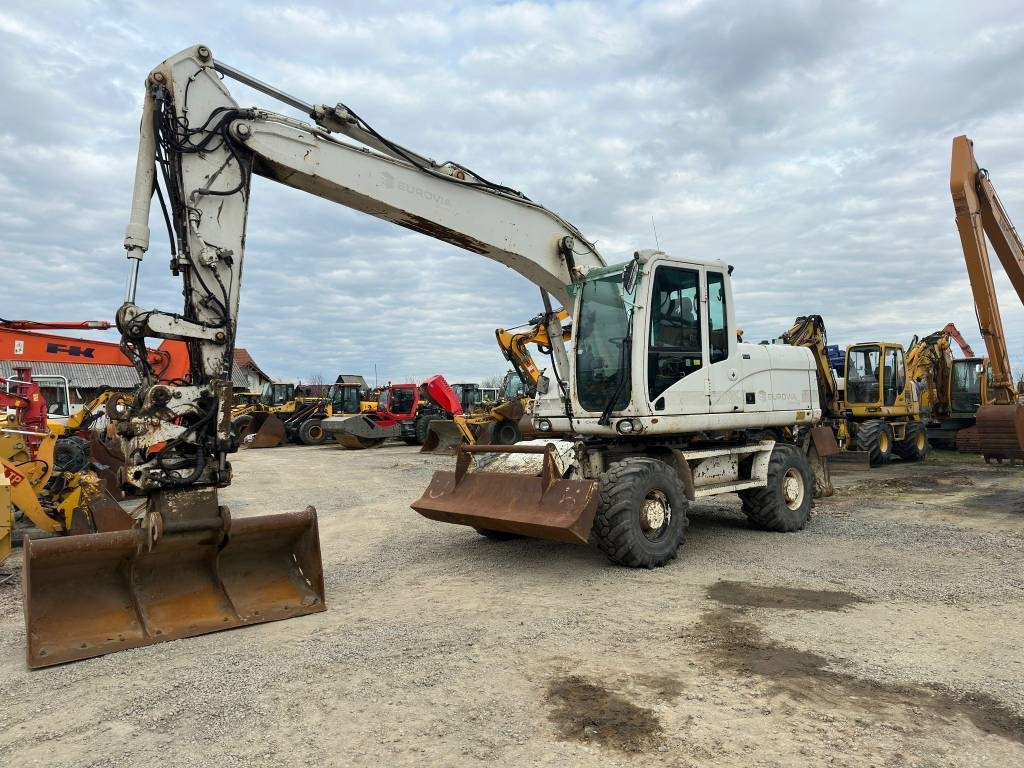 CAT M 316 D - Колесен багер: снимка 1 CAT M 316 D - Колесен багер: снимка 1