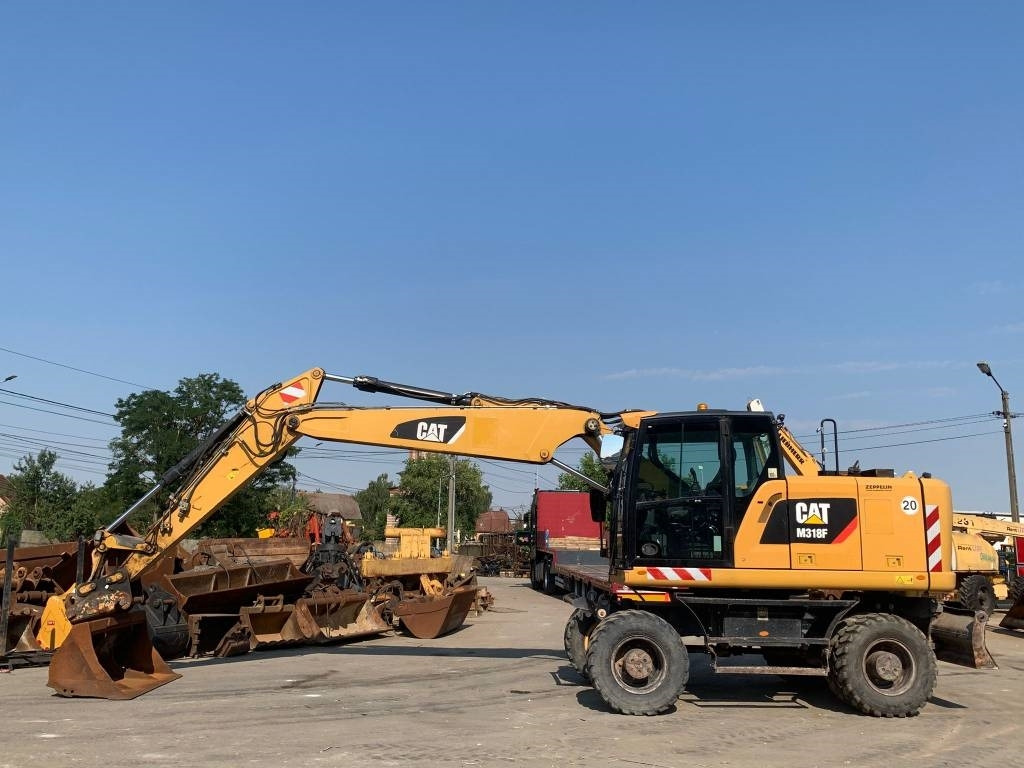 CAT M 318 F - Колесен багер: снимка 2 CAT M 318 F - Колесен багер: снимка 2
