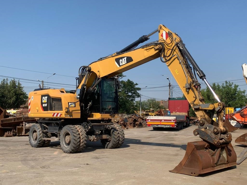 CAT M 318 F - Колесен багер: снимка 5 CAT M 318 F - Колесен багер: снимка 5