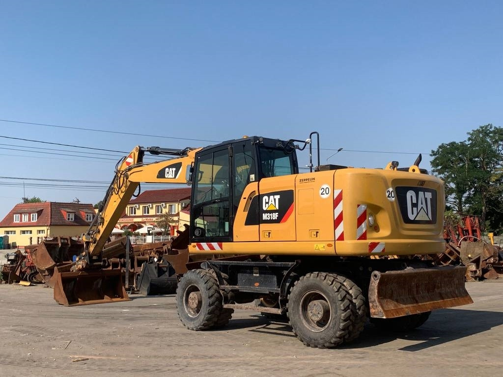 CAT M 318 F - Колесен багер: снимка 3 CAT M 318 F - Колесен багер: снимка 3
