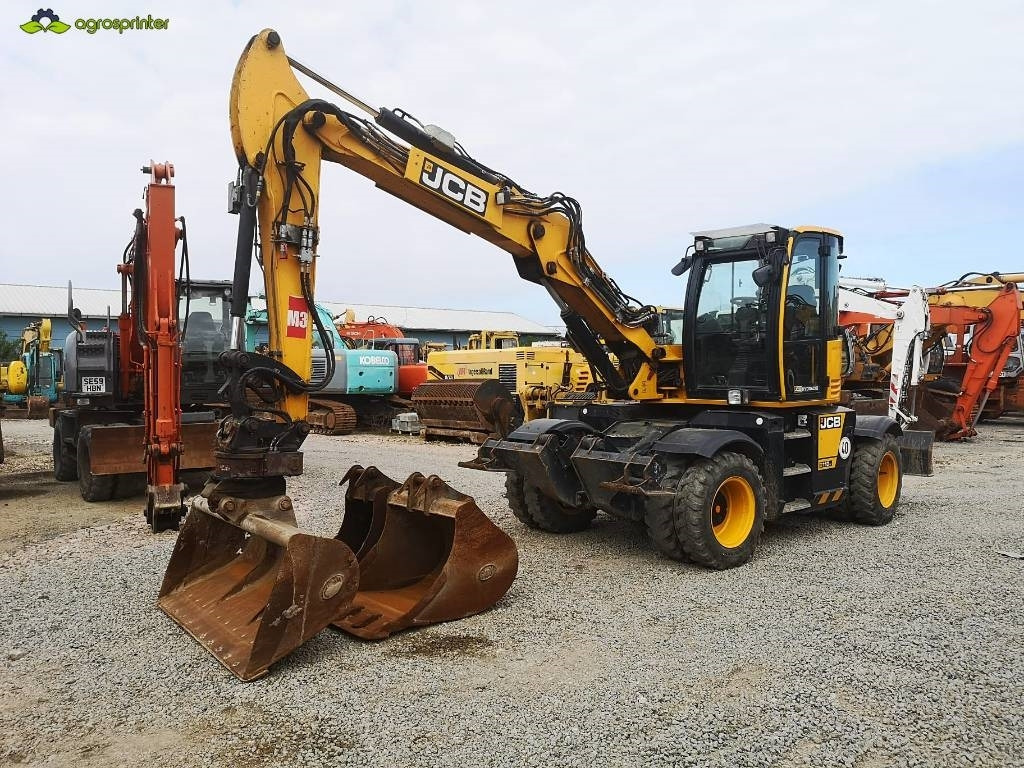 JCB Hydradig 110W - Колесен багер: снимка 1 JCB Hydradig 110W - Колесен багер: снимка 1