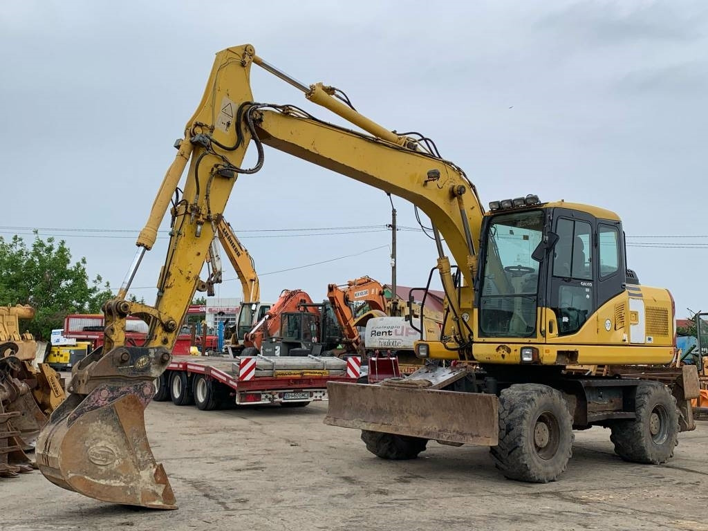 Komatsu PW 140-7 - Колесен багер: снимка 1 Komatsu PW 140-7 - Колесен багер: снимка 1