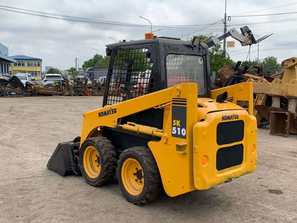 Komatsu SK 510 - Мини челен товарач: снимка 4 Komatsu SK 510 - Мини челен товарач: снимка 4