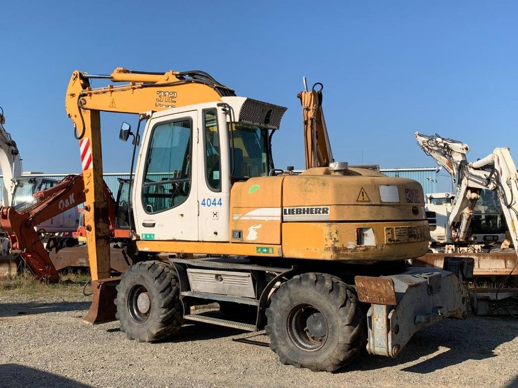 Liebherr A 312 - Колесен багер: снимка 3 Liebherr A 312 - Колесен багер: снимка 3