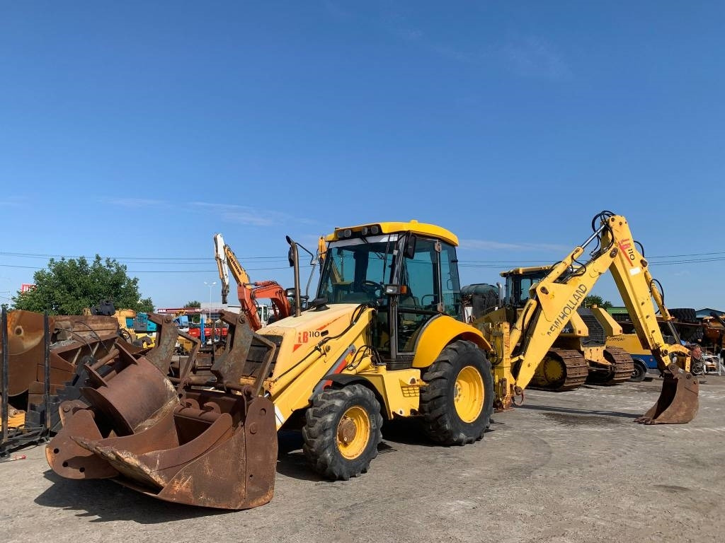 New Holland LB 110-4 PT - Багер-товарач: снимка 1 New Holland LB 110-4 PT - Багер-товарач: снимка 1