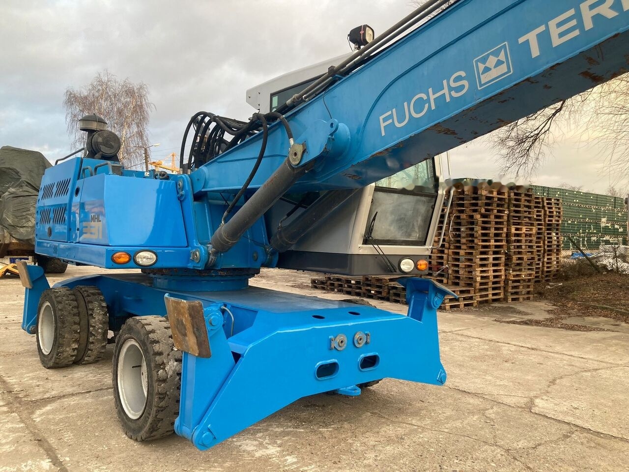 Fuchs MHL 331 D Generator - Багер за манипулиране на материали: снимка 5 Fuchs MHL 331 D Generator - Багер за манипулиране на материали: снимка 5