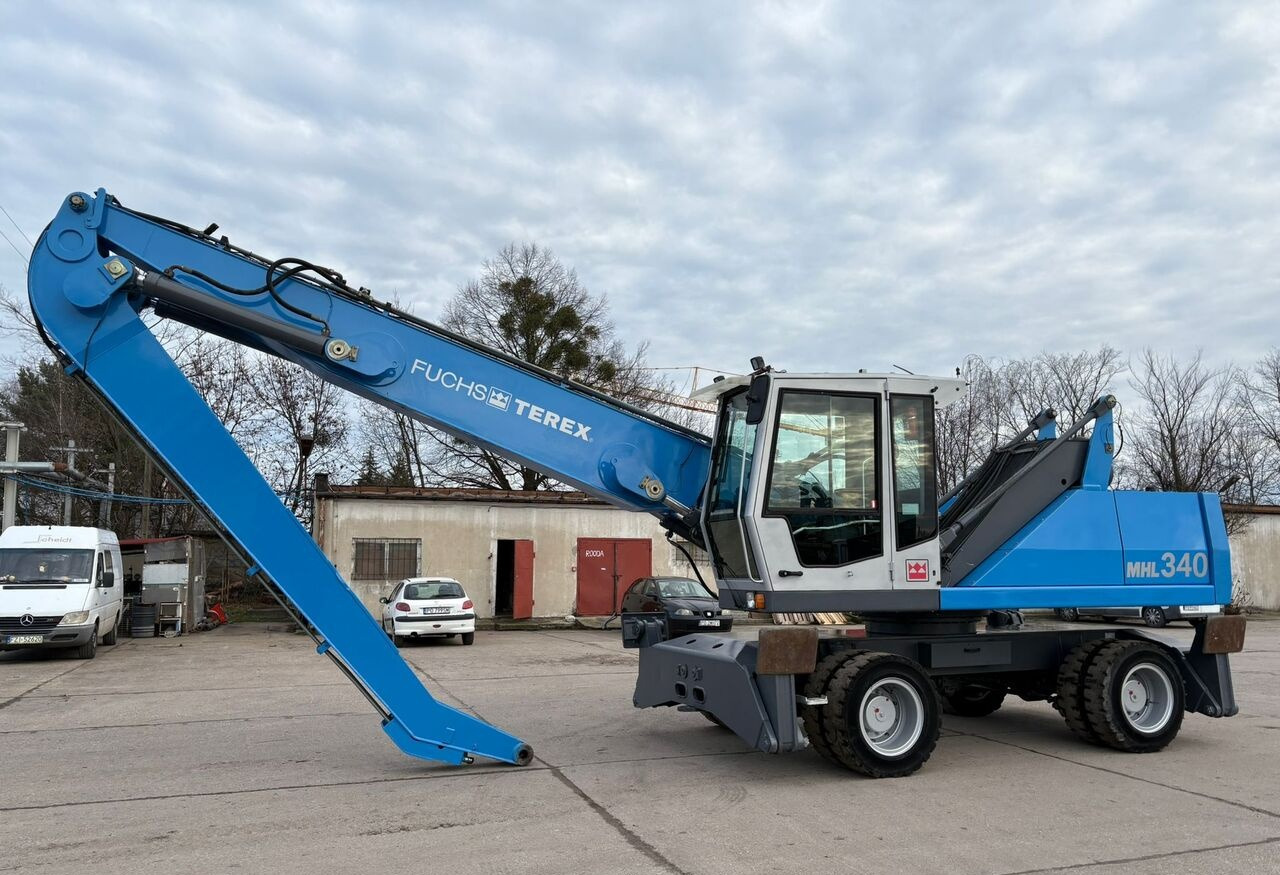Terex-Fuchs MHL 340 C - Багер за манипулиране на материали: снимка 1 Terex-Fuchs MHL 340 C - Багер за манипулиране на материали: снимка 1