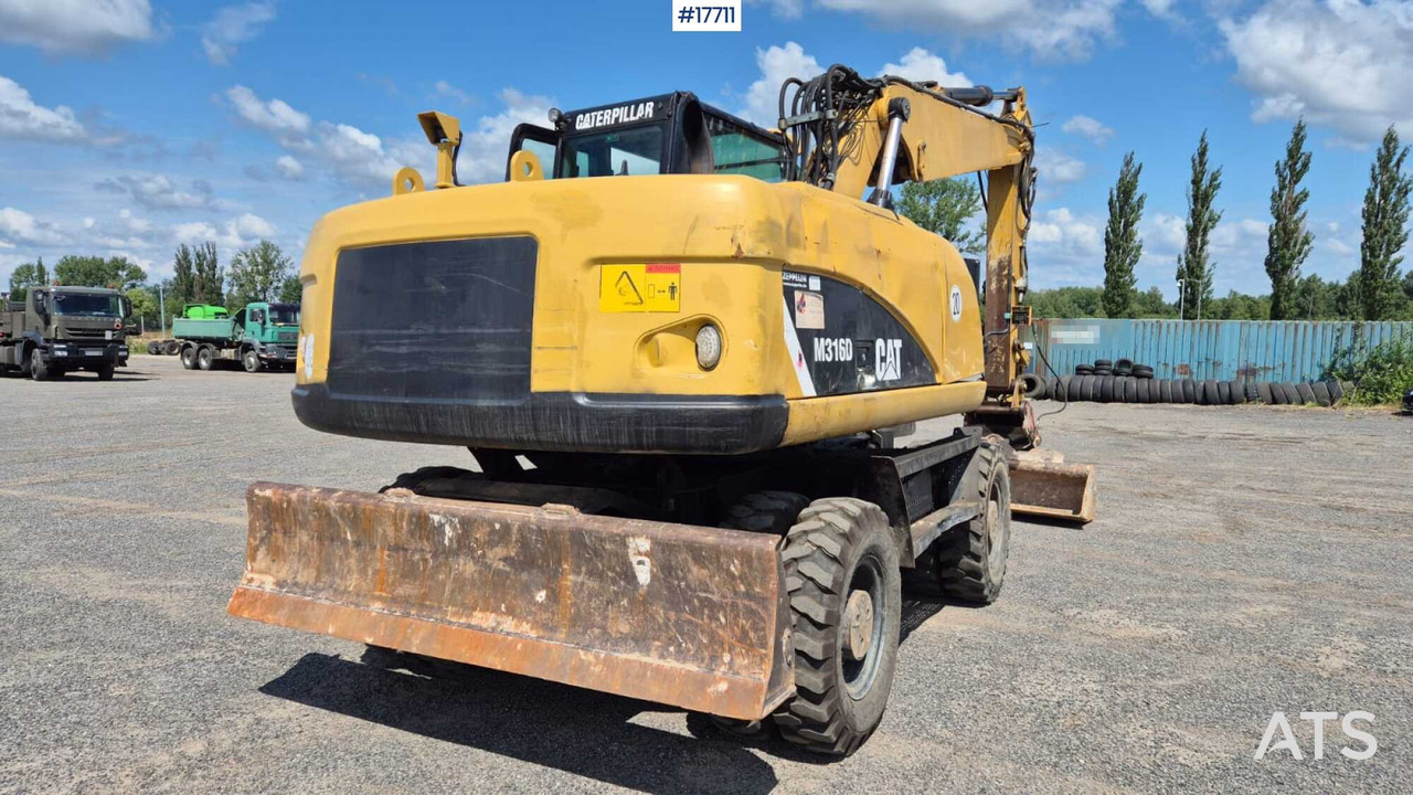 Колесен багер 2008 CAT M316D: снимка 12