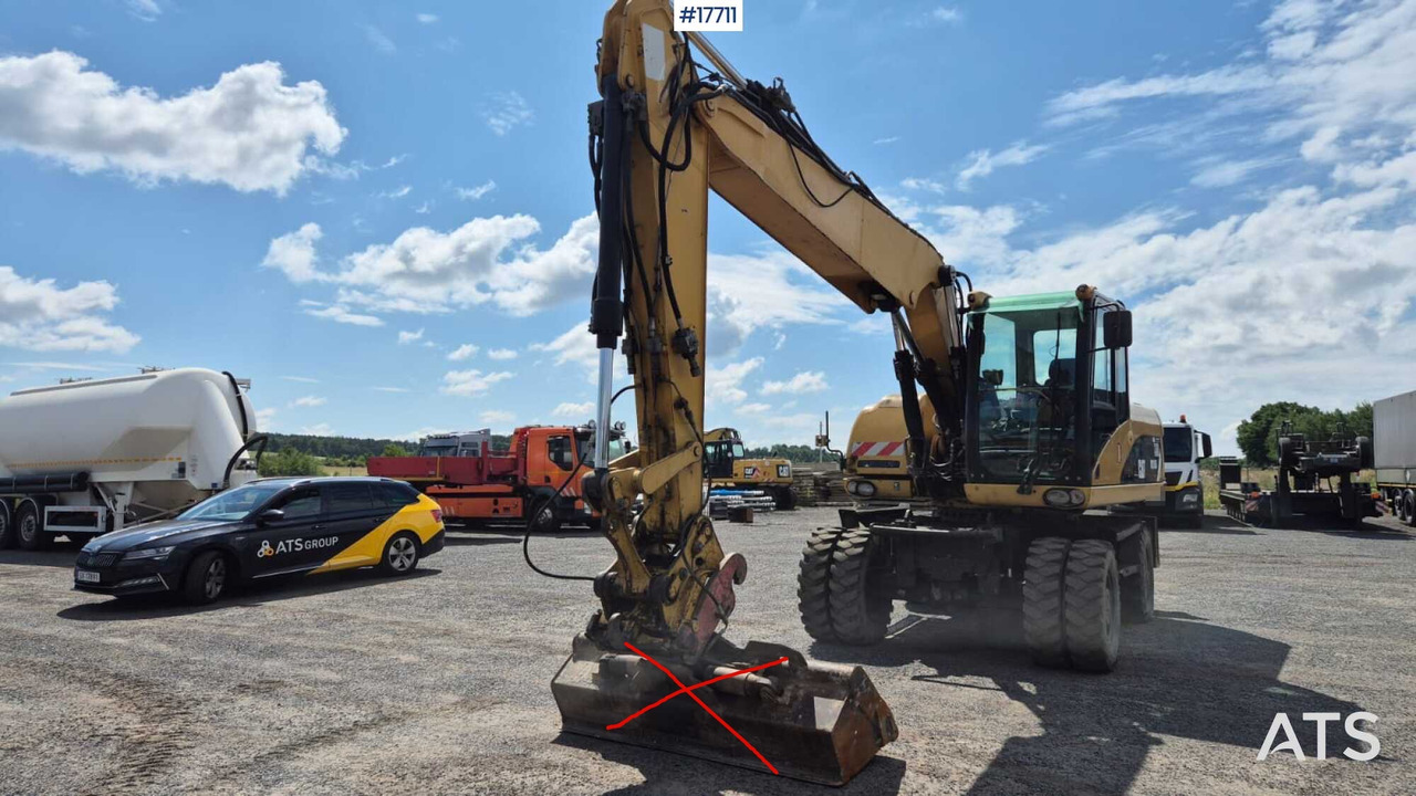 Колесен багер 2008 CAT M316D: снимка 8