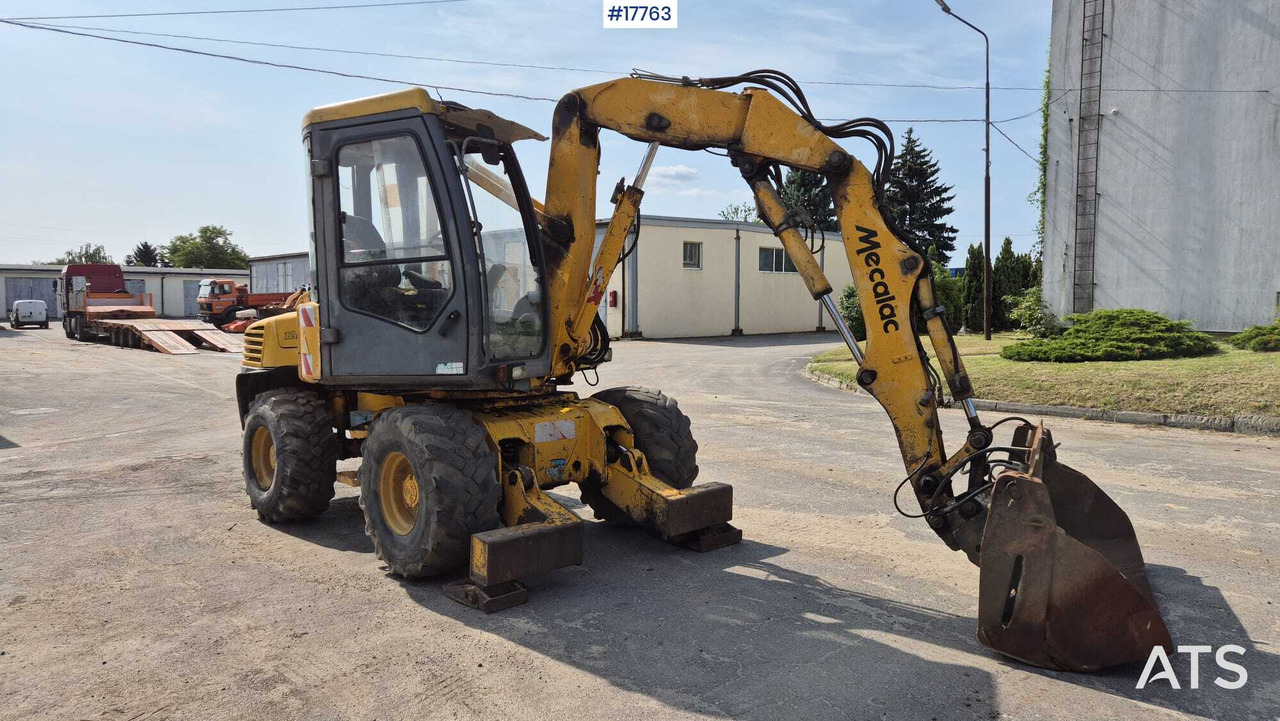 MECALAC 12MX wheeled excavator (1996) - Колесен багер: снимка 2 MECALAC 12MX wheeled excavator (1996) - Колесен багер: снимка 2