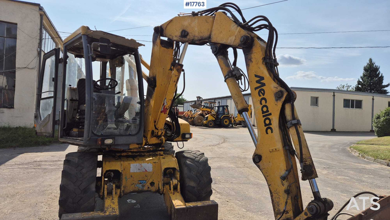 MECALAC 12MX wheeled excavator (1996) - Колесен багер: снимка 3 MECALAC 12MX wheeled excavator (1996) - Колесен багер: снимка 3