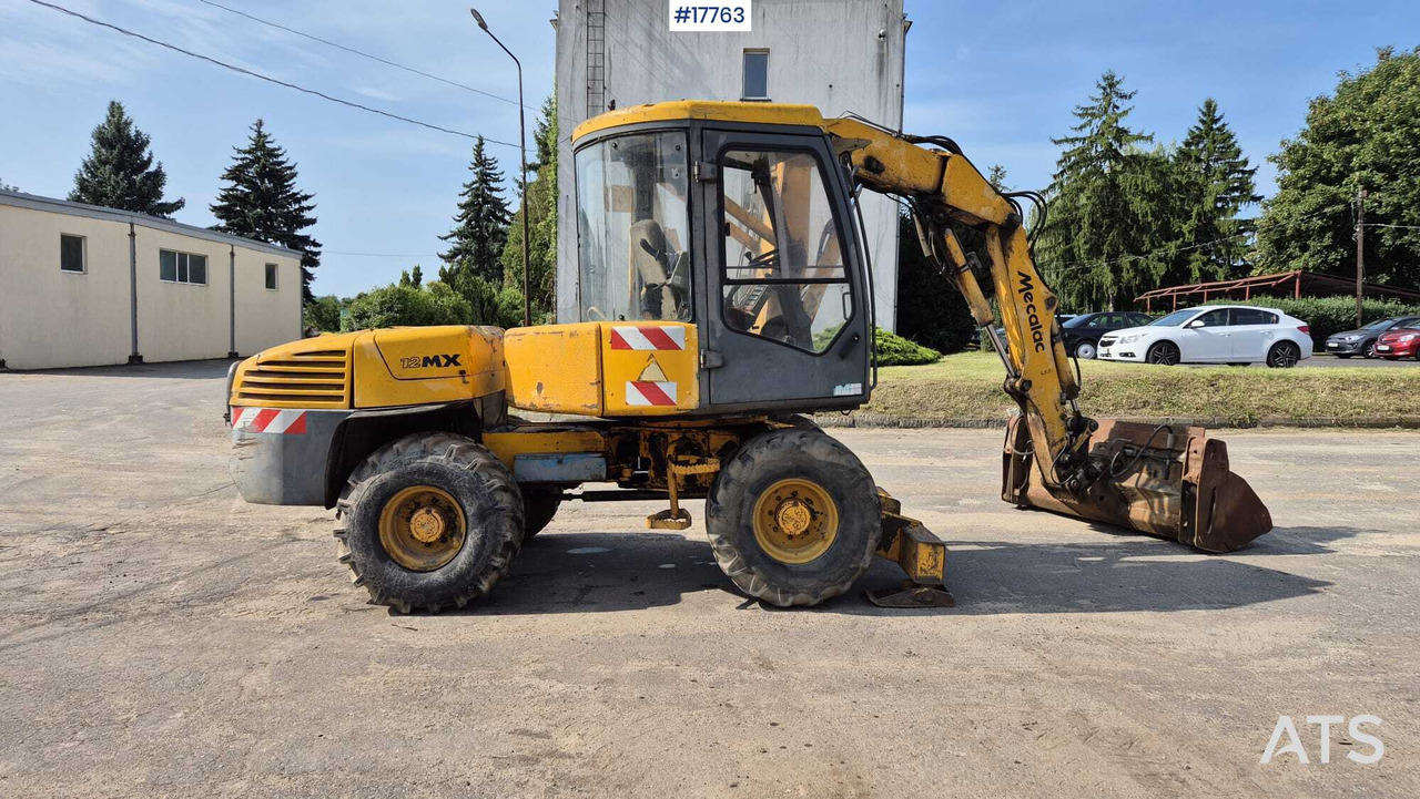 MECALAC 12MX wheeled excavator (1996) - Колесен багер: снимка 4 MECALAC 12MX wheeled excavator (1996) - Колесен багер: снимка 4