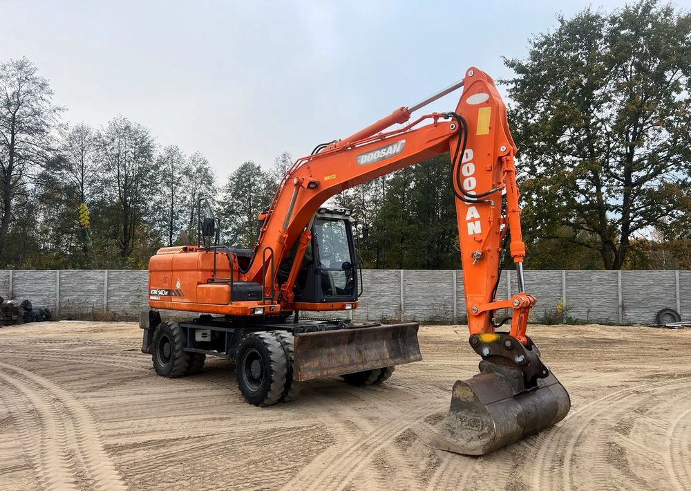 Doosan DX140W-3 - Колесен багер: снимка 1 Doosan DX140W-3 - Колесен багер: снимка 1