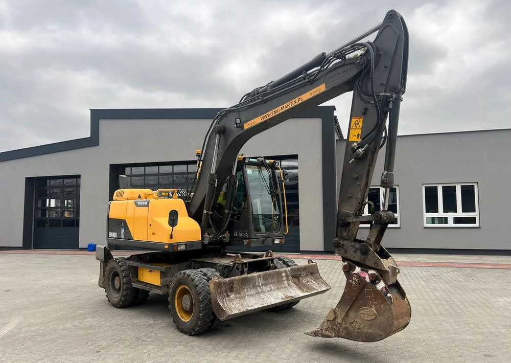 Volvo EW140D - Колесен багер: снимка 1 Volvo EW140D - Колесен багер: снимка 1